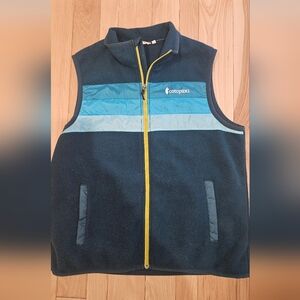 Cotopaxi Black Fleece Vest with Blue Stripes and Yellow Zipper